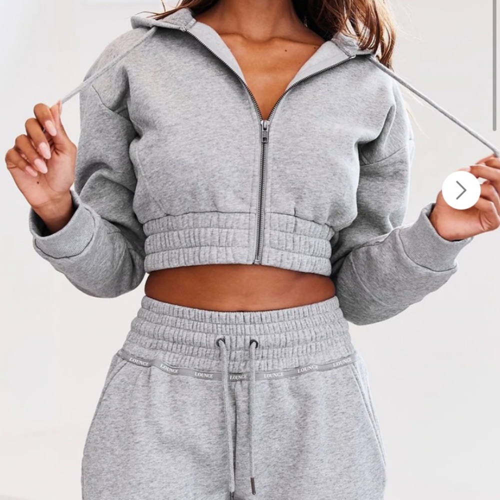 Brand new LOUNGE Apparel set. NWOT. Zip up scrunchie hoodie / scrunchie pants.